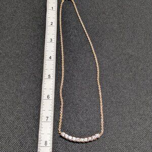 Elegant Gold-Toned Necklace with Sparkling Crystal Accents